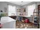 Bright home office featuring crafting space and sewing machine, perfect for creative endeavors at 109 Connor Ct, Kings Mountain, NC 28086