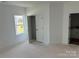 Bedroom with a window offering natural light and closet at 1110 Sugar Creek Rd, Indian Land, SC 29707