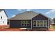 Home featuring gray siding and multiple windows providing natural light at 1110 Sugar Creek Rd, Indian Land, SC 29707