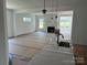 Open-concept living room with a fireplace and recessed lighting at 1110 Sugar Creek Rd, Indian Land, SC 29707