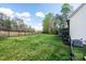 View of the home's expansive backyard featuring a fenced yard and well maintained lawn at 112 Whitman Ct # 275, Taylorsville, NC 28681