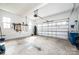 Spacious garage with ample storage, tools on the wall, and a functional garage door at 112 Whitman Ct # 275, Taylorsville, NC 28681