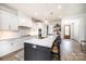 Bright, modern kitchen with granite countertops, stainless appliances and a large island at 112 Whitman Ct # 275, Taylorsville, NC 28681