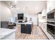 Spacious kitchen flows into the living area, featuring modern appliances and granite countertops at 112 Whitman Ct # 275, Taylorsville, NC 28681