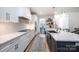 Gourmet kitchen featuring granite countertops, white cabinetry, and stainless steel appliances at 112 Whitman Ct # 275, Taylorsville, NC 28681