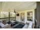 Cozy outdoor porch featuring comfortable seating, a ceiling fan, and scenic views at 112 Whitman Ct # 275, Taylorsville, NC 28681