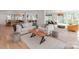 Open floor plan showcasing modern living room, kitchen, and dining area at 117 Wrenwood Ln, Charlotte, NC 28211