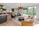 Bright, stylish space featuring seating area and an attached eat-in kitchen at 117 Wrenwood Ln, Charlotte, NC 28211