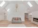 Bright living room with hardwood floors, stylish decor, and a cozy fireplace at 117 Wrenwood Ln, Charlotte, NC 28211