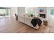 Bright living room featuring a modern fireplace, light wood floors and an open concept at 117 Wrenwood Ln, Charlotte, NC 28211