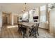 Dining area that features a chandelier and lots of light at 12526 Dunloe Wood Dr, Huntersville, NC 28078