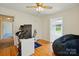 Bedroom featuring hardwood floors and ample space for a home office or extra seating at 140 Oak Ave, Mount Holly, NC 28120