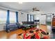 Relaxing living room area with hardwood floors, modern furniture, and natural light at 140 Oak Ave, Mount Holly, NC 28120