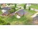 Lovely brick home featuring a fire pit, detached garage and fenced yard at 15118 Marshall Valley Ct, Mint Hill, NC 28227