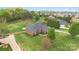 Charming brick home with well-manicured lawn and a fenced backyard at 15118 Marshall Valley Ct, Mint Hill, NC 28227