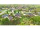 Brick house in a suburban neighborhood, mature trees, and manicured lawns at 15118 Marshall Valley Ct, Mint Hill, NC 28227