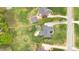 Expansive property featuring a well-maintained lawn, mature trees, and multiple structures on a spacious lot at 15118 Marshall Valley Ct, Mint Hill, NC 28227