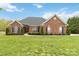 Stunning one-story red brick home with manicured lawn and beautiful landscaping at 15118 Marshall Valley Ct, Mint Hill, NC 28227
