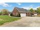 House with a three car garage and long driveway at 15118 Marshall Valley Ct, Mint Hill, NC 28227