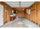 Unfinished garage with concrete floor and wood walls at 15118 Marshall Valley Ct, Mint Hill, NC 28227