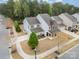 Beautiful home with manicured lawn and mature trees in a desirable neighborhood setting at 15324 Colonial Park Dr, Huntersville, NC 28078