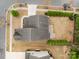 Aerial view of the home showcasing the roof, landscaping, and proximity to nearby streets at 15324 Colonial Park Dr, Huntersville, NC 28078