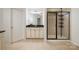 Bright bathroom featuring a vanity with a granite countertop and a glass-enclosed shower at 15324 Colonial Park Dr, Huntersville, NC 28078