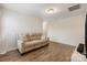 Spacious living room with ample natural light and wood floors at 15324 Colonial Park Dr, Huntersville, NC 28078