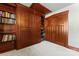 Bedroom with Murphy bed and built in bookshelves with door that leads to a bonus space at 1536 Bear Mountain Rd, Charlotte, NC 28214