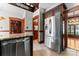 Updated kitchen featuring stainless steel refrigerator and granite countertops at 1536 Bear Mountain Rd, Charlotte, NC 28214