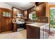 Gourmet kitchen with granite countertops, stainless steel appliances at 1536 Bear Mountain Rd, Charlotte, NC 28214