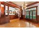 Spacious living room with hardwood floors, wood trim, and natural light at 1536 Bear Mountain Rd, Charlotte, NC 28214