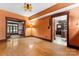 Cozy living room showcasing hardwood floors and vintage lighting at 1536 Bear Mountain Rd, Charlotte, NC 28214