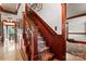 Elegant staircase with intricate wood detailing and patterned carpet runner at 1536 Bear Mountain Rd, Charlotte, NC 28214