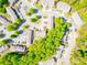 An aerial view of a neighborhood showcasing its layout and mature trees at 162 Limerick Rd # C, Mooresville, NC 28115