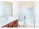 Bathroom with a dark vanity, glass enclosed shower, and tile flooring at 162 Limerick Rd # C, Mooresville, NC 28115