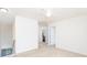 Open area near a staircase with views of other doorways and a ceiling fan at 162 Limerick Rd # C, Mooresville, NC 28115