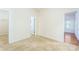 Bright bedroom features neutral carpet, and an open doorway to another room at 162 Limerick Rd # C, Mooresville, NC 28115