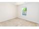 Bedroom with carpet flooring, neutral paint, and a window bringing in natural light at 162 Limerick Rd # C, Mooresville, NC 28115
