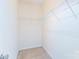 A walk-in closet with white wire shelving and neutral colored carpet at 162 Limerick Rd # C, Mooresville, NC 28115