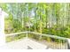 Back deck with view of a private, wooded lot at 162 Limerick Rd # C, Mooresville, NC 28115
