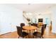 Bright dining area complemented by hardwood floors and an open concept design at 162 Limerick Rd # C, Mooresville, NC 28115
