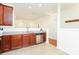 Open kitchen with granite countertops, stainless steel appliances, and a view of the dining and living areas at 162 Limerick Rd # C, Mooresville, NC 28115