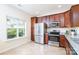 Bright kitchen featuring stainless steel appliances, granite countertops, and abundant cabinet space at 162 Limerick Rd # C, Mooresville, NC 28115