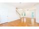 Spacious living area showcasing hardwood floors, natural light, and access to the staircase at 162 Limerick Rd # C, Mooresville, NC 28115