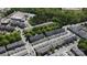 Aerial view of townhome community with lush green trees at 164 Singleton Rd, Mooresville, NC 28117