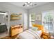 Bedroom featuring an ensuite bathroom, a single bed, and toys at 164 Singleton Rd, Mooresville, NC 28117