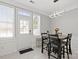 Dining area filled with natural light, neutral paint, and a modern lighting fixture at 164 Singleton Rd, Mooresville, NC 28117