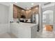 Bright kitchen with wooden cabinets, stainless appliances, large sink, and quartz countertops at 164 Singleton Rd, Mooresville, NC 28117
