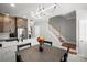 Kitchen next to the stairs with stainless appliances and undermount sink at 164 Singleton Rd, Mooresville, NC 28117